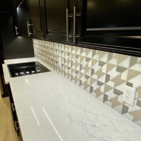 Mosaic tile & marble backsplash